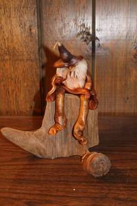 lot 100 image: Unique Handcrafted Wizard Figurine on Wooden Base
