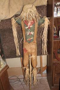 lot 111 image: Handcrafted Decorative Straw Scarecrow Figure with Straw Hat