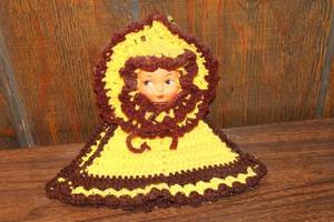 lot 125 image: Vintage Crochet Doll with Yellow and Brown Dress