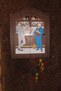 lot 152 image: Wall-Mounted Dartboard Set with Illustrated Bar Scene