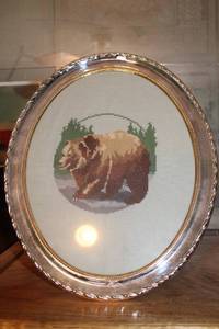 lot 186 image: Framed Cross-Stitch Artwork of a Bear with Silver Frame