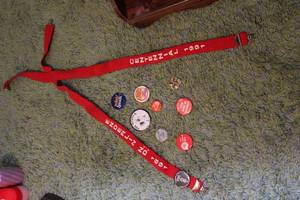 lot 210 image: Vintage Red Sash with Assorted Pins and Buttons Collection