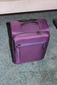lot 227 image: American Tourister Purple Carry-On Suitcase with Wheels