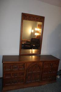 lot B-238 image: Vintage Wooden Dresser with Mirror and Decorative Door