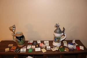 lot 267 image: Set of 2 Vintage Beer Steins with Collectible Matchbooks