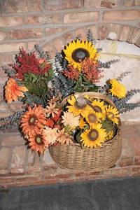 lot 276 image: Artificial Floral Arrangement in Woven Basket with Sunflowers and Fall Decor