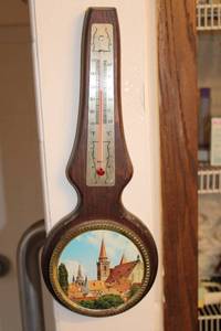lot 287 image: Vintage Wooden Wall Thermometer with Scenic City Landscape