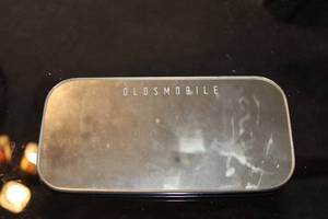 lot 290 image: Oldsmobile Branded Metallic Sunglasses Case