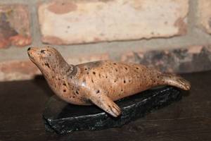 lot 331 image: Carved Soapstone Seal Figurine on a Base with Artist Signature