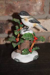lot 333 image: Limited Edition RSPB Black-Capped Chickadee Figurine on Holly Tree Base
