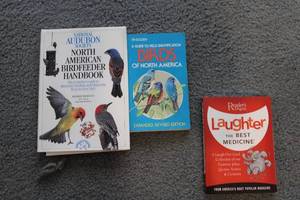 lot 367 image: Set of 3 Bird and Humor Books - North American Birdfeeder Handbook, Birds of North America, Laughter The Best Medicine