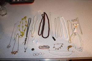 lot 384 image: Collection of 17 Necklaces and Bracelets with Various Designs