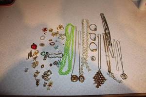 lot 385 image: Collection of Vintage Costume Jewelry Including Necklaces, Brooches, and Earrings