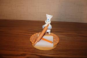 lot 390 image: Pillsbury Doughboy Notepad Holder with Pencil
