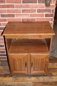 lot 397 image: Vintage Wooden Rolling Storage Cabinet with Double Doors