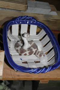 lot 452 image: Decorative Ceramic Snake in Blue and White Basket