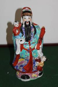 lot 28 image: Vintage Chinese Porcelain Figurine of Immortal with Children