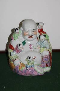 lot 35 image: Vintage Porcelain Laughing Buddha with Children Figurine