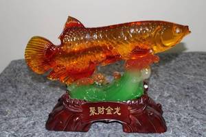 lot A-44 image: Resin Arowana Fish Sculpture with Floral Base