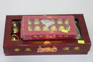 lot 79 image: Set of 12 Gold-Finished Feng Shui Chinese Ingots