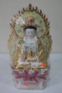 lot 83 image: Porcelain Kwan Yin Statue with Gold Accents