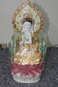 lot 118 image: Elegant Gold and Porcelain Guan Yin Statue