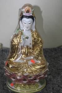 lot 126 image: Exquisite Porcelain Buddha Figurine with Gold and Floral Accents