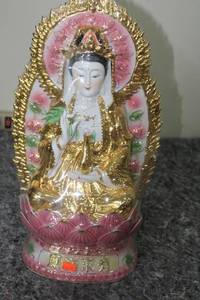 lot 129 image: Porcelain Kuan Yin Goddess Figurine with Floral Accents