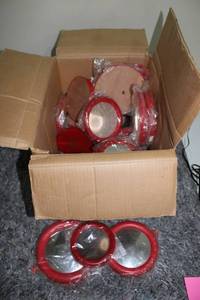 lot 173 image: Set of 10 Red Tin Lids with Sealed Packaging