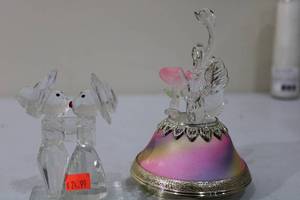 lot 274 image: Collection of Two Elegant Crystal Figurines, Swan with Flower and Kissing Couple