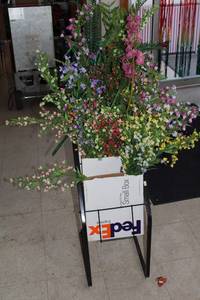 lot 20 image: Collection of Artificial Flowers in FedEx Small Box Rack