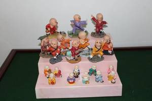 lot 26 image: Lot of 17 Decorative Miniature Monk Figurines