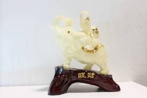 lot 390 image: Exquisite Handcrafted White Elephant Sculpture with Gold Accents