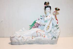 lot 395 image: Exquisite Porcelain Musician Figurine with Intricate Floral Details
