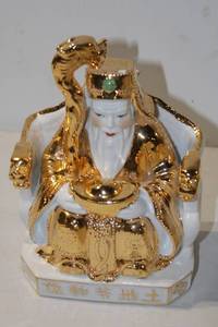 lot 428 image: Gold and White Ceramic Figurine of Chinese Deity with Snake