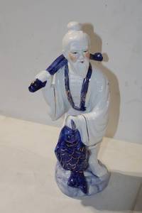 lot 429 image: Vintage Chinese Porcelain Fisherman Figurine with Blue and White Detailing