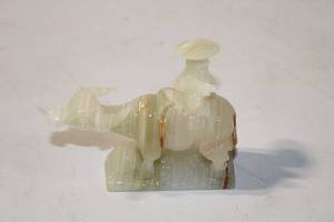 lot 437 image: Intricately Carved Jade Figurine of a Camel with Rider