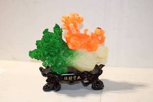 lot 476 image: Handcrafted Carving of a Mythical Creature with Green and Orange Accents