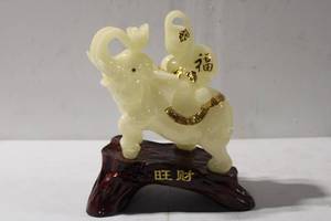 lot 483 image: Decorative Resin Elephant Statue with Gold Accents on Base