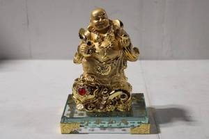 lot 494 image: Golden Lucky Buddha Figurine with Glass Base and Decorative Box