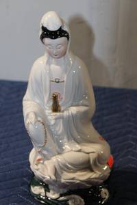 lot 510 image: Elegant Porcelain Guanyin Statue with Intricate Details