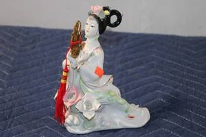 lot 512 image: Vintage Chinese Porcelain Figurine of a Woman with Red Tassel