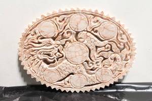 lot 565 image: Intricately Carved Oval Marble Plaque with Mythical Design