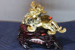 lot 581 image: Golden Guardian Lion with Wooden Base