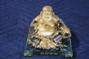 lot 587 image: Golden Laughing Buddha Figurine on Glass Base