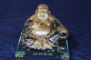lot 588 image: Golden Laughing Buddha Figurine on Glass Base