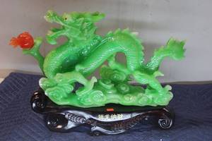 lot 594 image: Exquisite Handcrafted Green Dragon Figurine with Red Ornament