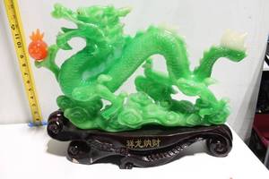 lot 613 image: Exquisite Green Dragon Sculpture with Orange Orb Detail
