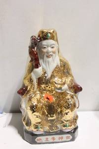 lot 615 image: Ceramic Golden Fortune God Statue with Decorative Detailing