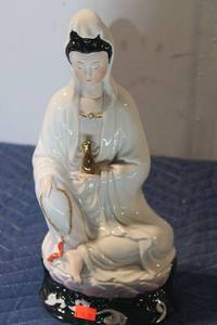 lot 634 image: Elegant Porcelain Statue of a Woman in Traditional Attire